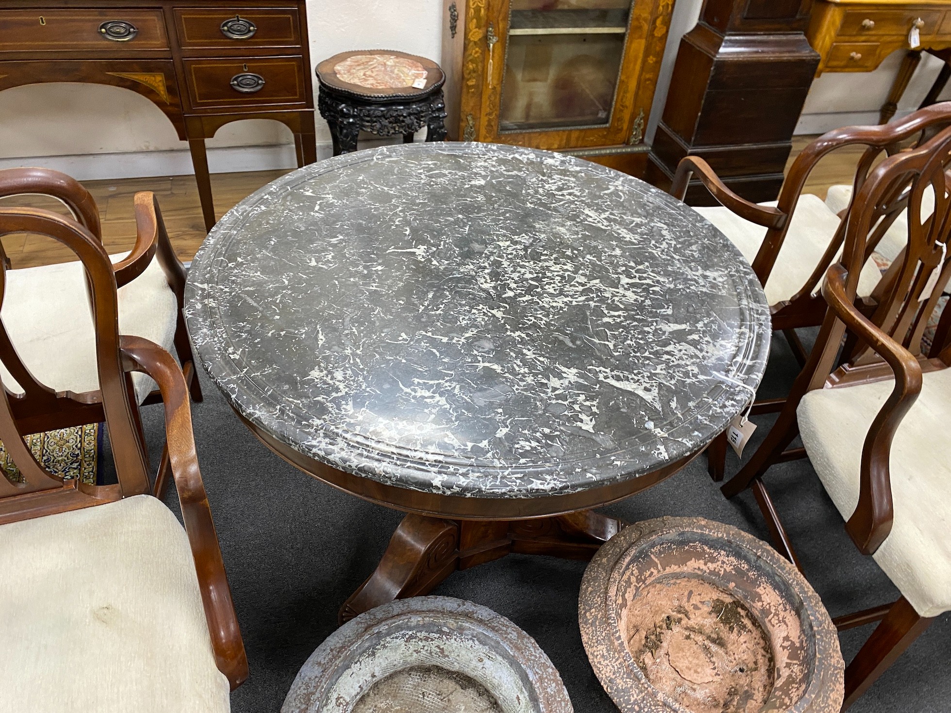 A French Empire style circular mahogany marble topped centre table, diameter 89cm, height 74cm